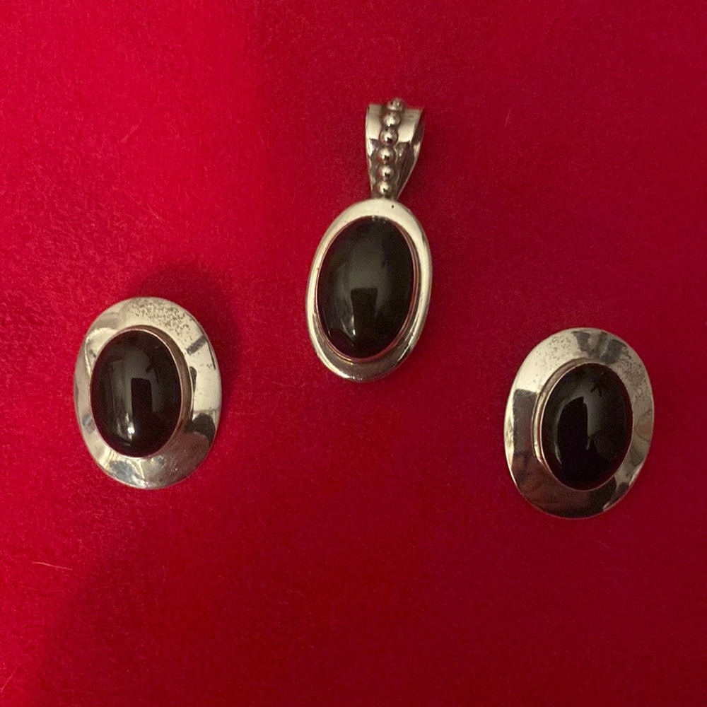 Necklace charm and matching earrings.